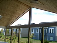 <b>Another photo during the building process of the interior of the room, before the posts are wrapped in vinyl and the windows and screens are installed.</b>